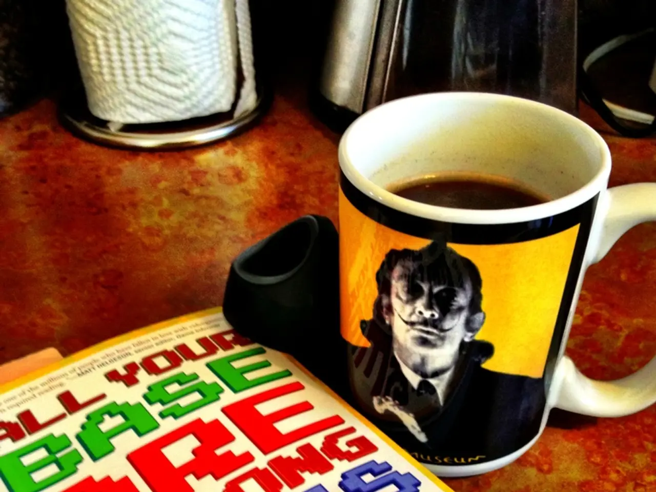 In this image there is a table truncated, there are objects on the table, there are objects...