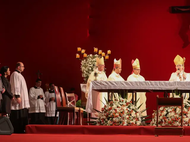 Faithful German youth recites petitions at Mass during the Holy Year celebrations