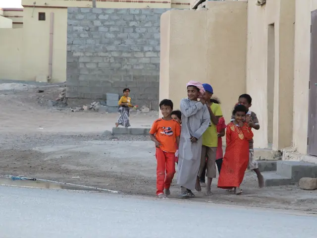 Gathering in Stein: Belarusian Kids Enjoying Pizza with the Town Mayor
