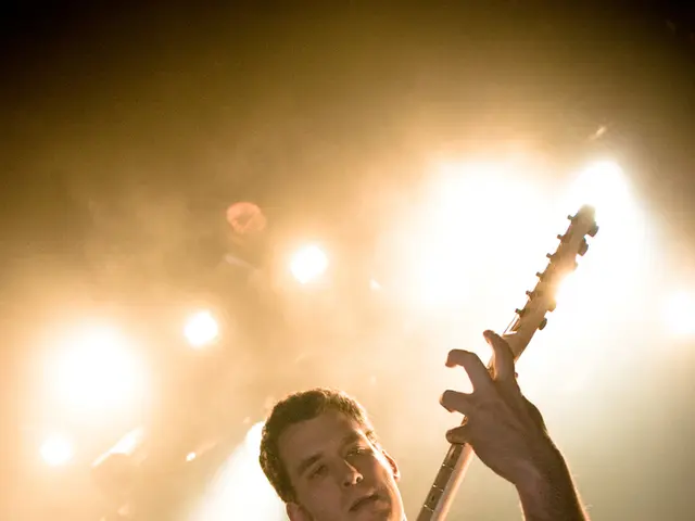 Grandma wonders why Josh Jenkinson spends excess time mimicking guitar play on virtual platform,...