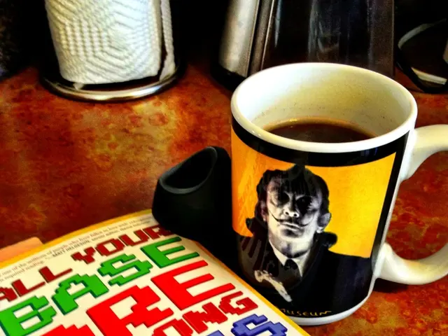 In this image there is a table truncated, there are objects on the table, there are objects...